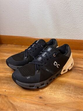 On Running Black and Cream Cloudswift Sneakers